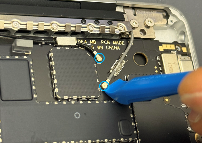 Screenshot that shows disconnecting the coax cables from the motherboard.