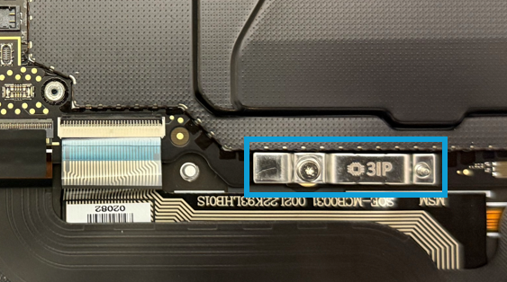 Screenshot that shows the screw securing the motherboard steel bracket to the enclosure prior to removal.
