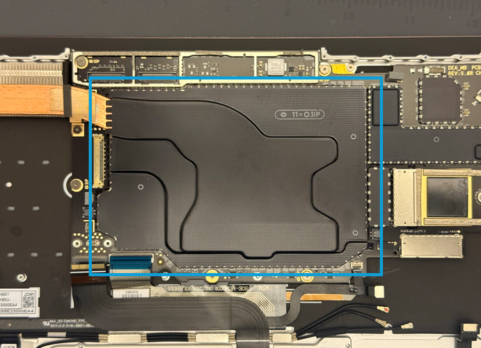 Screenshot that shows peeling up the T1 shield with a nylon spudger.