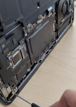 Screenshot that shows removing the left hinge screws